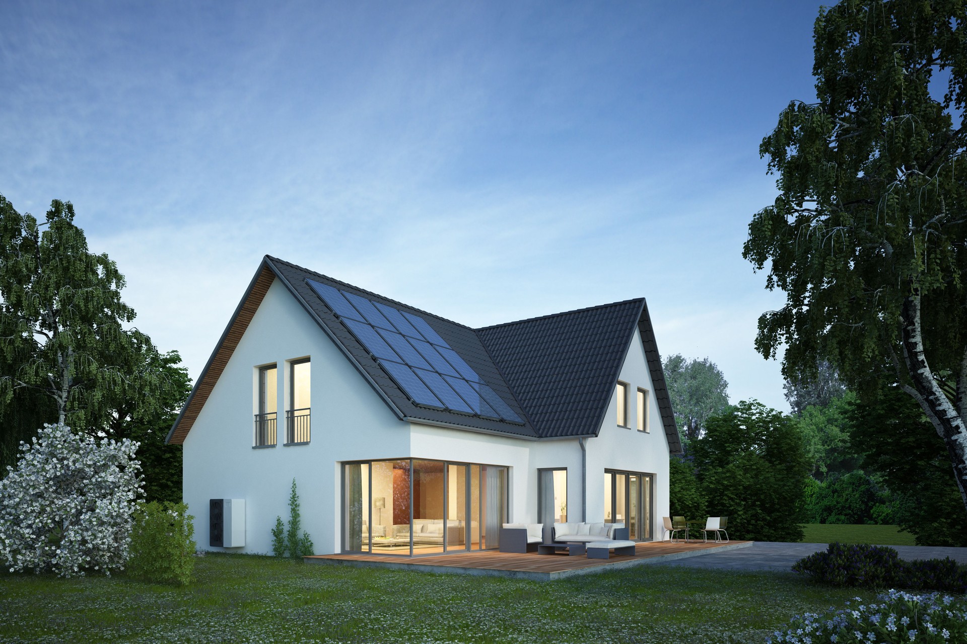 Modern house in the evening with electric heat pump